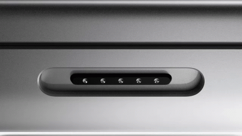 A Close Up Of A Gray Item With A Few Buttons On It GIF