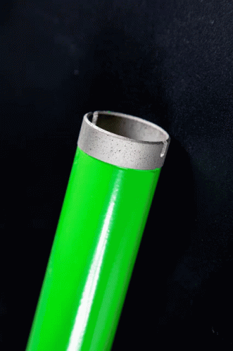 A Close Up Of A Green Pipe With A Silver Ring On It GIF
