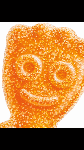 A Close Up Of A Gummy Bear With A Smile On Its Face GIF