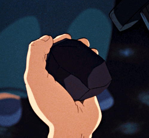 Close-Up Of Hand Holding Cube GIF