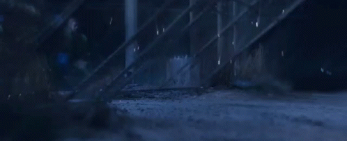 A Close Up Of A Hose Spraying Water On A Concrete Surface . GIF