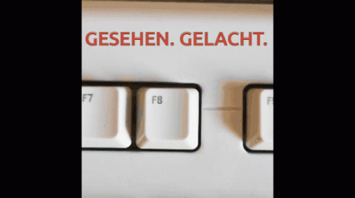 A Close Up Of A Keyboard With The Words Gesehen Gelacht On It GIF