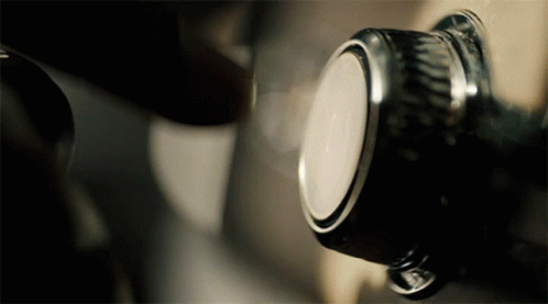 A Close Up Of A Knob With A White Circle In The Middle GIF