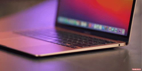 A Close Up Of A Laptop With A Purple Background That Says Thinkfiles On The Bottom GIF
