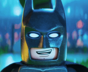 A Close Up Of A Lego Batman Smiling GIF