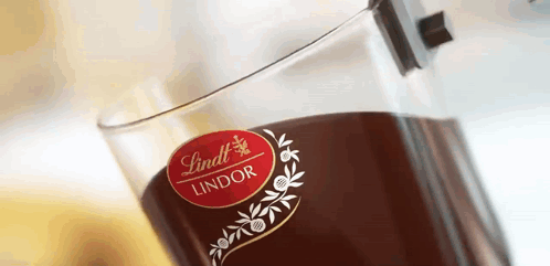 A Close Up Of A Lindt Lindor Glass GIF