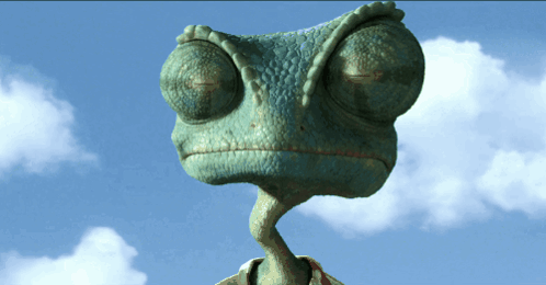 A Close Up Of A Lizard 'S Face Against A Blue Sky With Clouds GIF