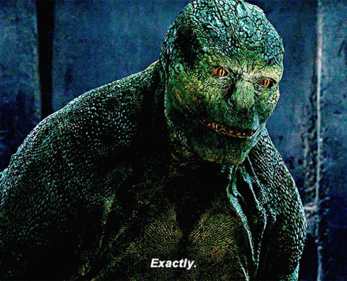 A Close Up Of A Lizard With The Words Exactly Written Below It GIF