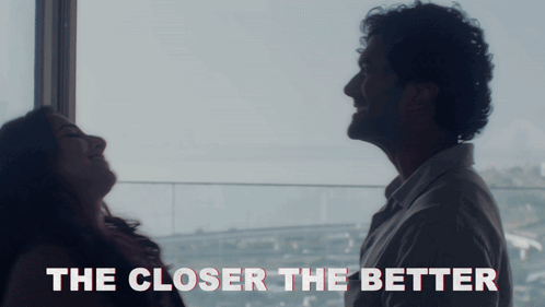 A Close Up Of A Man And Woman With The Words The Closer The Better GIF