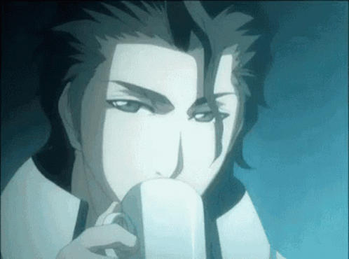 Close Up Of Man Drinking From White Cup GIF