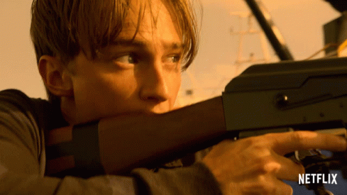 Man Holding Gun With Netflix Logo GIF