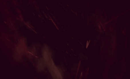 A Close Up Of A Man Holding His Head With Both Hands GIF