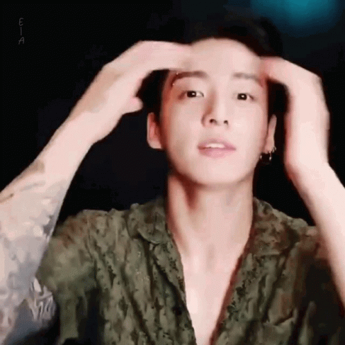 Close Up Of Man Holding Head With Hands GIF