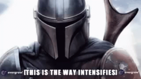 A Close Up Of A Man In A Helmet With The Words `` This Is The Way Intensifies '' . GIF