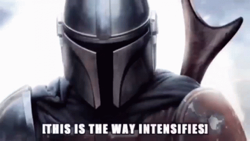 A Close Up Of A Man In A Helmet With The Words `` This Is The Way Intensifies '' Above Him . GIF