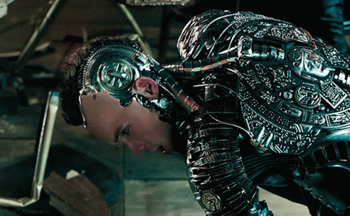 A Close Up Of A Man In A Robotic Suit With A Watermark That Says ' Fourteenth ' GIF