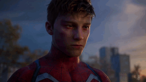 A Close Up Of A Man In A Spider-Man Suit GIF
