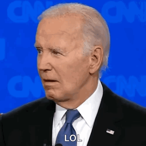 Close Up Of Man In Suit Making Funny Face GIF