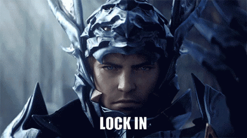 A Close Up Of A Man In Armor With The Words Lock In Behind Him GIF