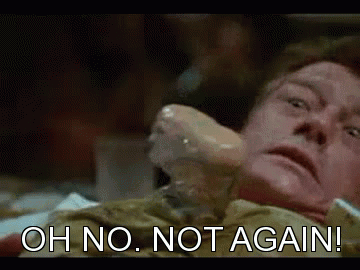 A Close Up Of A Man Laying On A Bed With The Words `` Oh No , Not Again '' Written On The Bottom . GIF