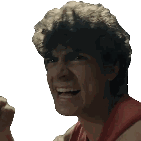 a close up of a man making a funny face