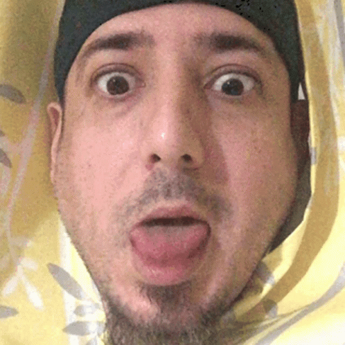 A Close Up Of A Man Making A Funny Face GIF