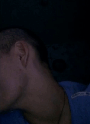 A Close Up Of A Man Making A Funny Face With His Eyes Closed And His Mouth Open . GIF