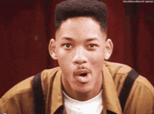 A Close Up Of A Man Making A Funny Face With His Mouth Open GIF