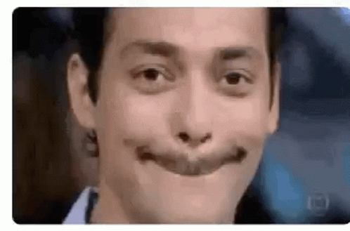 A Close Up Of A Man Making A Funny Face With His Mouth Wide Open . GIF