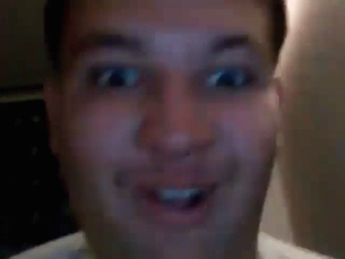 A Close Up Of A Man Making A Funny Face With His Tongue Hanging Out . GIF