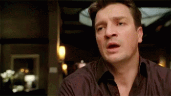 A Close Up Of A Man Making A Surprised Face GIF