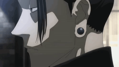 A Close Up Of A Man 'S Ear With A Piercing In It . GIF