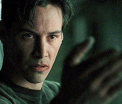 A Close Up Of A Man 'S Face And Hand GIF