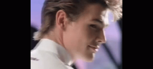 A Close Up Of A Man 'S Face And Neck . GIF