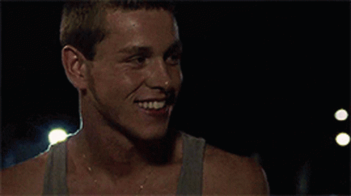 A Close Up Of A Man 'S Face And Neck GIF
