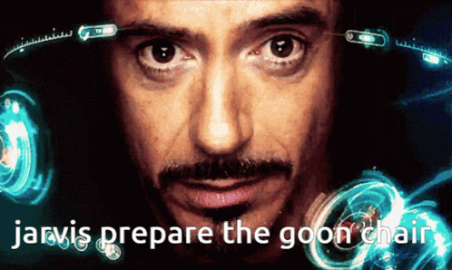 A Close Up Of A Man 'S Face And The Words Jarvis Prepare The Goon Chair GIF