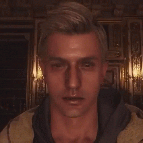 A Close Up Of A Man 'S Face In A Video Game . GIF