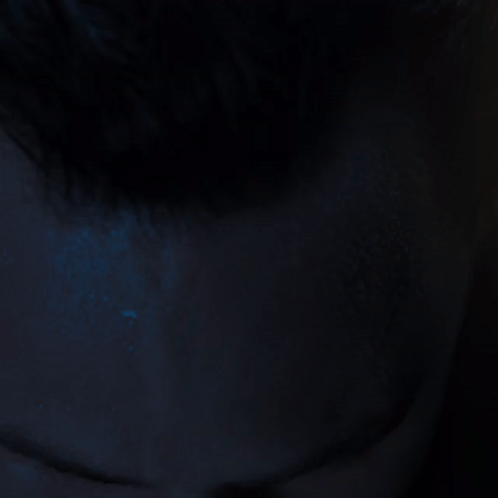 Man In Dark With Eyes Closed GIF