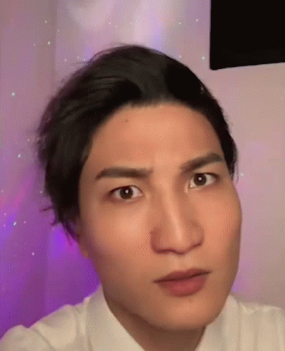 A Close Up Of A Man 'S Face Making A Funny Face GIF