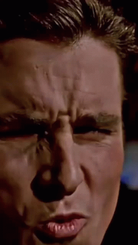 A Close Up Of A Man 'S Face Making A Funny Face GIF