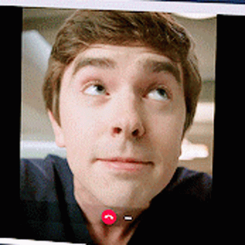 A Close Up Of A Man 'S Face On A Screen GIF