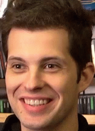 A Close Up Of A Man 'S Face Smiling GIF