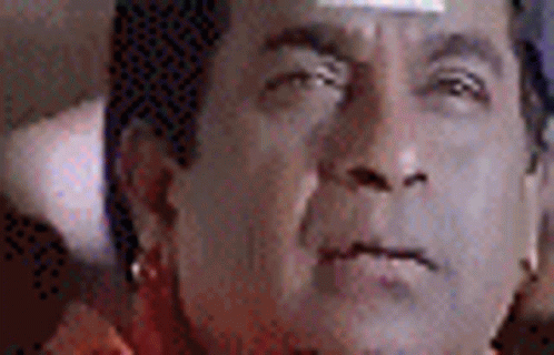 A Close Up Of A Man 'S Face With A Bandage On It . GIF
