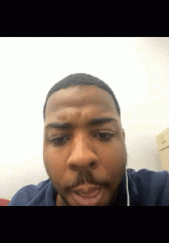 A Close Up Of A Man 'S Face With A Beard GIF