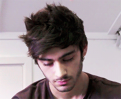 A Close Up Of A Man 'S Face With A Beard GIF