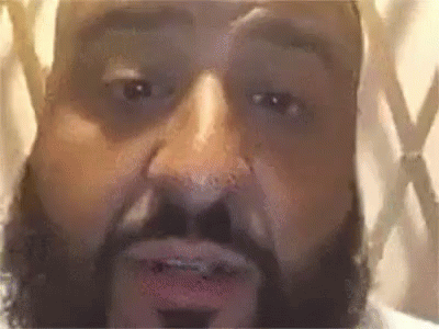 A Close Up Of A Man 'S Face With A Beard . GIF