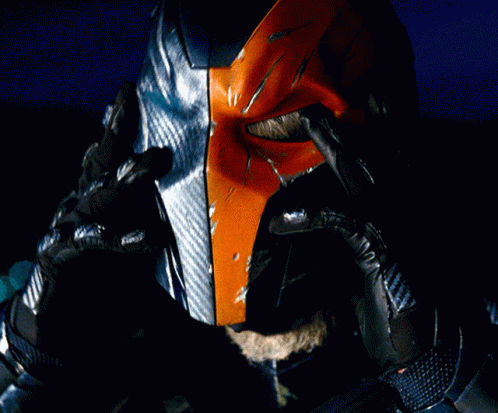 A Close Up Of A Man 'S Face With A Beard And A Black Headband That Says ' Armour ' GIF