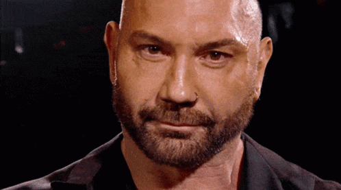 A Close Up Of A Man 'S Face With A Beard And A Nose Ring GIF
