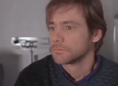 Close Up Of Man's Face With Beard And Serious Expression GIF