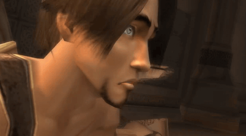 A Close Up Of A Man 'S Face With A Beard And Blue Eyes GIF